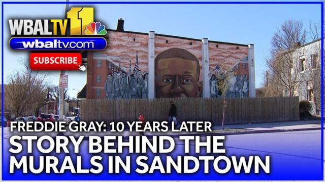 Advocates: Murals are backdrop to community still in distress