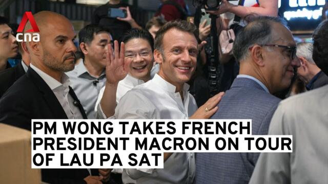 French President Macron and Singapore PM Lawrence Wong visit Lau Pa Sat hawker centre
