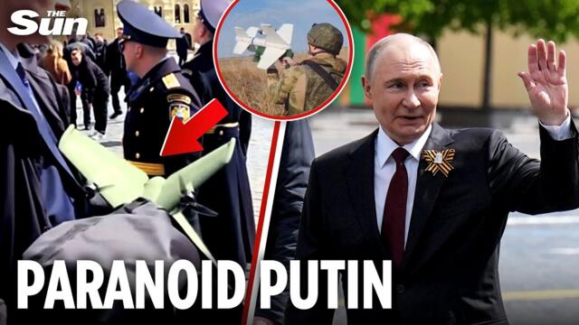 Moment terrified Putin is escorted by anti-drone rocket launcher on public walkabout