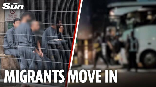 Bus load of asylum seekers are 'snuck into' 4-star hotel at night despite UK-wide protests