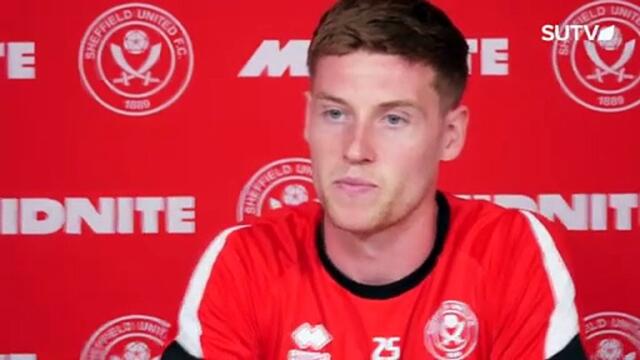 Mark McGuinness faces the media after his Sheffield United switch