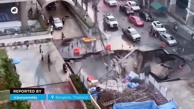 A gigantic sinkhole swallows several cars in front of Bajira Hospital in Bangkok, Thailand. The depth could reach 50 meters