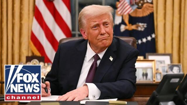 President Trump signs executive orders from the Oval Office