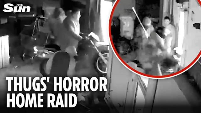 Terrifying moment gang armed with KNIVES & AXES storm house after smashing down door with motorbike