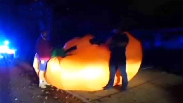 Cops Struggle To Wrangle Rolling Giant Inflatable Pumpkin