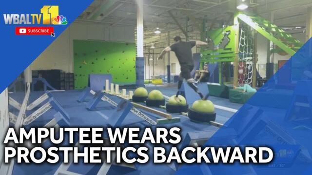 Amputee uses prosthetics facing backward