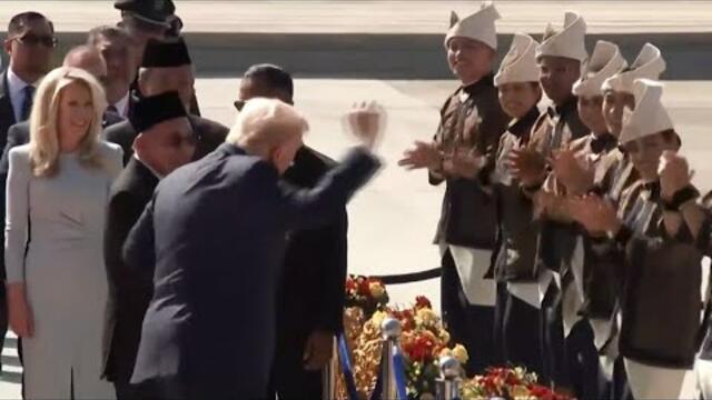 Trump dances in Malaysia after Air Force One landing at airport reception kicks off Asia trip
