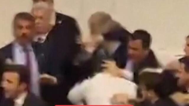 Brawl erupts in Turkish parliament as opposition protests against new justice minister.