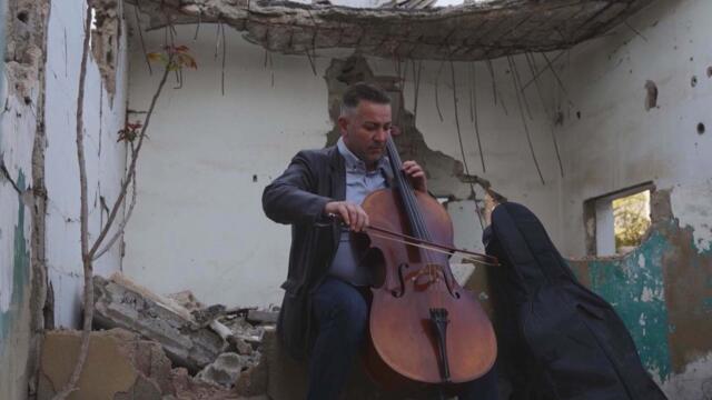 Cellist Plays In Ruins Of City