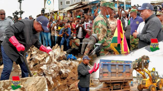 President Mahama goes down into Alajo Gutters to result them with Shovel on National Sanitation day