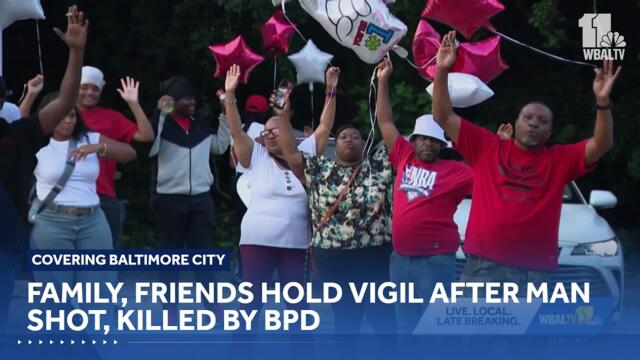 Family, friends hold candlelight vigil after man shot, killed by Baltimore police