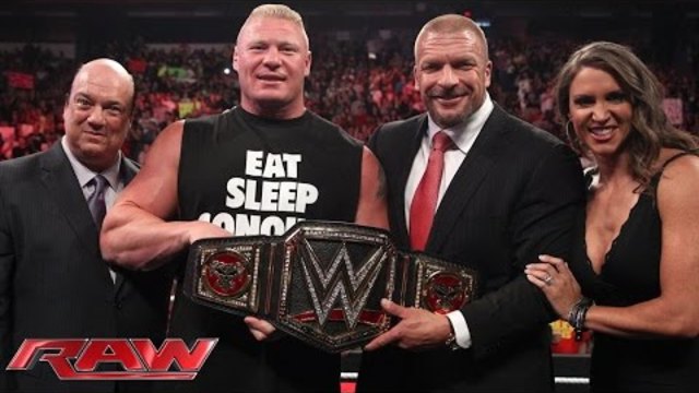 Brock Lesnar receives the new WWE World Heavyweight Championship: Raw, Aug. 18, 2014