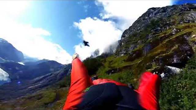 EXTREME descent from a cliff on a Wingsuit with 360° Camera