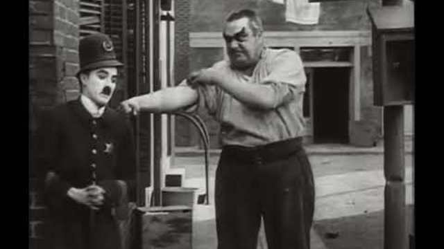 Charlie Chaplin Easy Street (1917)