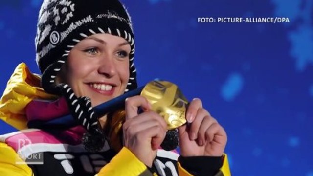 Олимпийската шампионка Magdalena Neuner немски шампион